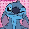 Plaid Polaire Stitch Disney en rose
